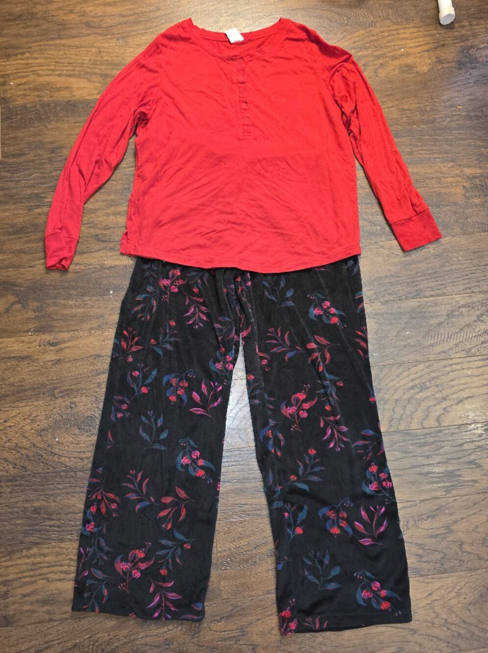 stars above Red Long-Sleeve Top with Black Floral Lounge Pants